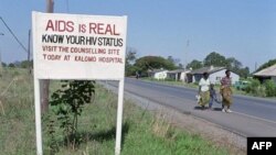 Road sign in Zambia urging AIDS awareness.