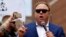 FILE - Alt-right conspiracy theorist Alex Jones speaks during a rally near the Republican National Convention in Cleveland, Ohio, July 18, 2016.