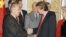 Soviet leader Mikhail Gorbachev shakes hands with New York real estate tycoon Donald Trump, at the State Department in Washington, Dec. 9, 1987 prior to a luncheon in Gorbachev's honor.