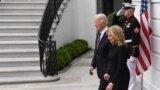 US President Joe Biden and First Lady Jill Biden walk to welcome Japan's Prime Minister Fumio Kishida and his spouse Yuko Kishida (off frame) as they arrive at the South Portico of the White House in Washington, DC, on April 9, 2024. (Photo by OLIVIER DO