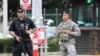 Security stands guard outside the main gate at Joint Base Pearl Harbor-Hickam, in Hawaii, Dec. 4, 2019.