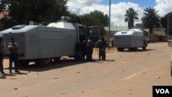 Police with water cannon vehicles outside the MDC-T headquarters in Bulawayo.