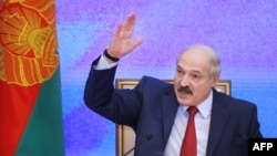 FILE - Belarus' President Alexander Lukashenko gestures during a press conference in Minsk, Jan. 29, 2015. 