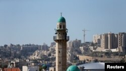 The minaret of a mosque is seen in the Palestinian neighbourhood of Beit Safafa in Jerusalem March 8, 2017.