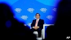 FILE - Vietnamese Prime Minister Pham Minh Chinh speaks at the World Economic Forum in Davos, Switzerland, Jan. 22, 2025. According to an online paper, he told his Cabinet to prepare for a possible global trade war. 