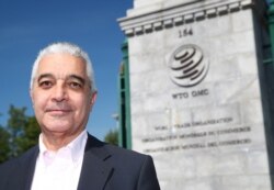 FILE - Egypt's Hamid Mamdouh, one of the first people to officially declare his candidacy to replace Roberto Azevedo as director-general of the World Trade Organization (WTO), poses in Geneva, June 2, 2020.