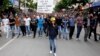 Protesters march as they demonstrate to blame the ruling AK Party (AKP) government for the mining disaster in Soma, a district in Turkey's western province of Manisa May 16, 2014. Turkish police fired water cannon and tear gas on Friday to disperse a crow