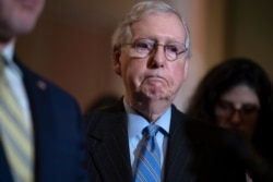 Senate Majority Leader Mitch McConnell, R-Ky., speaks to reporters on Capitol Hill in Washington, Feb. 25, 2020.