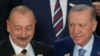 Ilham Aliyev, Azerbaijan president, and Turkey President Recep Tayyip Erdogan, right, pose for a group photo at the COP29 U.N. Climate Summit, Nov. 12, 2024, in Baku, Azerbaijan.