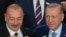 Ilham Aliyev, Azerbaijan president, and Turkey President Recep Tayyip Erdogan, right, pose for a group photo at the COP29 U.N. Climate Summit, Nov. 12, 2024, in Baku, Azerbaijan.