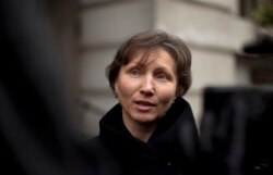 FILE - Marina Litvinenko, widow of former Russian intelligence officer Alexander Litvinenko, addresses media following pre-inquest review, London, Dec. 13, 2012.