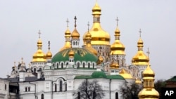 The golden cupolas of the 1000-year old Monastery of Caves (Pechersk) are seen in Kyiv, Ukraine, Nov. 2, 2018.