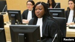 FILE - ICC chief prosecutor Fatou Bensouda looks on during the case against Congolese militia leader Bosco Ntaganda [not shown] at the International Criminal Court in The Hague, Feb. 2014.