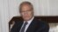 Syrian Vice President Farouk Al-Sharaa, meets in Damascus, Syria with Alaeddin Boroujerdi, not shown, the head of Iran's powerful parliamentary committee on national security and foreign policy ending rumors that Al-Sharaa had defected to Jordan, August 
