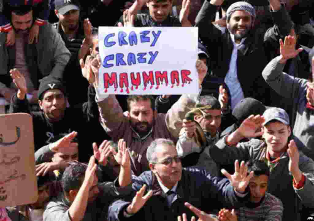 Libyan protesters demonstrate against Libyan leader Moammar Gadhafi, in Tobruk, Libya, on Wednesday. (AP/Hussein Malla)