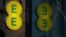 FILE - Signage is seen outside an EE mobile phone shop in Manchester, Britain, Sept, 21, 2017. 
