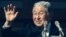 Japan's Emperor Akihito waves to well-wishers as he appears on the bullet-proofed balcony of the Imperial Palace in Tokyo, Dec. 23, 2017. Akihito marked his 84th birthday on Saturday with a pledge to fulfill his duties until the day of his abdication in 2019, and to prepare for "passing the torch to the next era." 