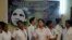 FILE - Indian nurses gather to pay their respects for nurse Aruna Shanbaug at a hospital in Mumbai, India, May 18, 2015. Shanbaug died on May 18 after 42 years in a coma following a brutal rape, in a case that led India to ease some restrictions on euthan