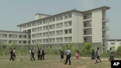 FILE - This image made from May 21, 2014, video shows a building at the Pyongyang University of Science and Technology. Agriculture researcher Kim Hak-song, who had been working at the Pyongyang University of Science and Technology, was arrested May 6 on suspicion of "hostile acts" against the North Korean government.