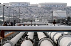 FILE - A picture shows export oil pipelines at an oil facility in Iran's Kharg Island, on the shore of the Persian Gulf, Feb. 23, 2016.