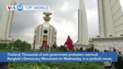 VOA60 Addunyaa - Anti-government protesters took over Bangkok's Democracy Monument after confronting pro-monarchists