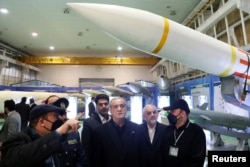 Iranian President Masoud Pezeshkian visits the Ministry of Defense missile and defense achievements exhibition in Tehran on Feb. 2, 2025. (Iran's presidential website/West Asia News Agency via Reuters)