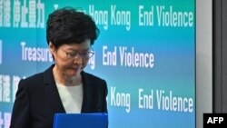 Hong Kong Chief Executive Carrie Lam leaves after a press conference in Hong Kong on October 4, 2019.
