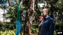 FILE - Prime Minister of Ethiopia Abiy Ahmed stands during an event honoring the national defense forces, in Addis Ababa, Nov. 17, 2020. 