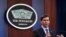 FILE - Defense Secretary Mark Esper speaks at the Pentagon in Washington, Dec. 20, 2019. After the Pensacola shooting, Esper ordered a review of the Pentagon's handling of foreign military students.