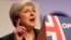 British Prime Minister Theresa May delivers her keynote address on the final day of at the Conservative Party Conference in Birmingham, Oct. 3, 2018.