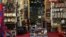A man waits tourists at a souvenirs shop at the Khan el-Khalili market in Old Cairo, March 17, 2013. 