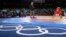Cuba's Gustavo Balart, left, competes with South Korea's Choi Gyu-jin during a 55-kg Greco-Roman wrestling competition, London, Aug. 5, 2012.