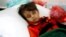 A girl infected with cholera rests at a hospital in Sanaa, Yemen, May 7, 2017.