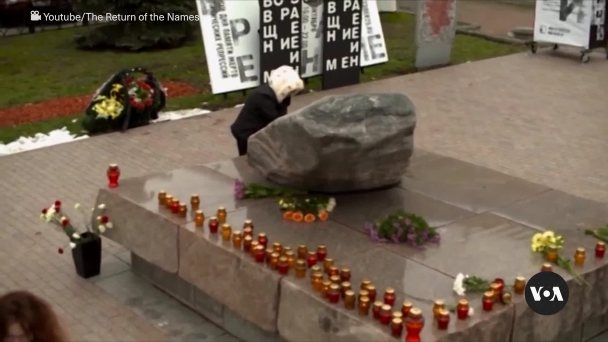 Russian activists abroad keep the memory of Soviet purges victims alive