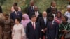 China's President Xi Jinping and his wife, Peng Liyuan, get ready to pose for a group photo with leaders from African countries at the Forum on China-Africa Cooperation in the Great Hall of the People in Beijing, Sept. 4, 2024. 