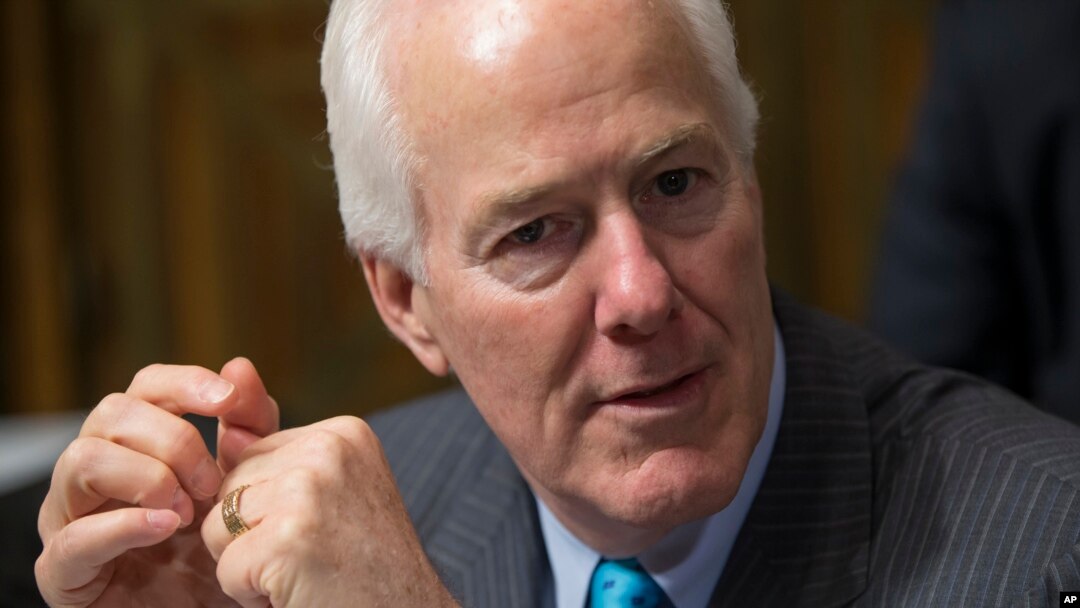 FILE - Sen. John Cornyn, R-Texas, the Senate majority whip, arrives for hearing at the Senate Judiciary Committee on Capitol Hill in Washington, March 16, 2016.