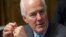 FILE - Sen. John Cornyn, R-Texas, the Senate majority whip, arrives for hearing at the Senate Judiciary Committee on Capitol Hill in Washington, March 16, 2016.