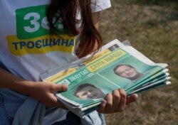 A volunteer holds electoral materials in support of the Servant of the People party led by Ukrainian President Volodymyr Zelenskiy during an event ahead of the parliamentary election in Kiev, Ukraine, July 18, 2019.
