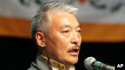 Former President of the Tibetan Association of Washington, Tashi N. Khamshitsang