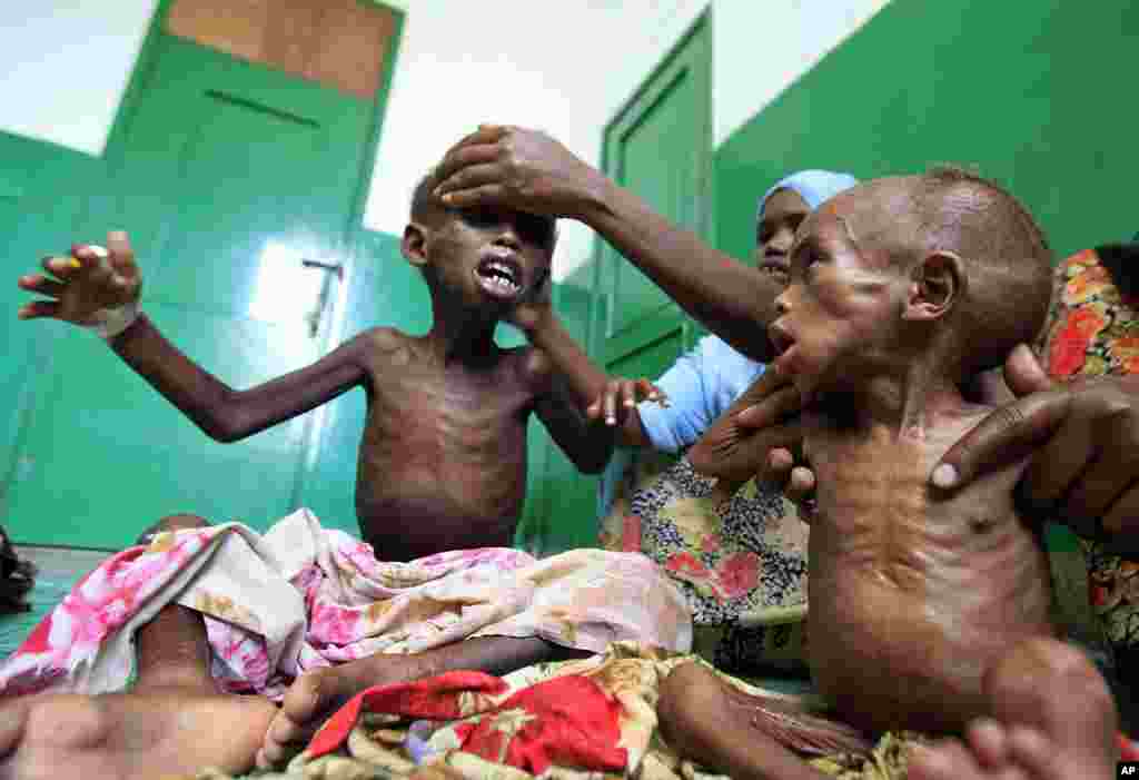 Malnourished Somali children are seen inside a paediatric ward at the Banadir hospital in Mogadishu, August 4, 2011. (Reuters)