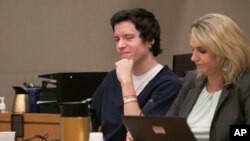 FILE - Defendant John Earnest reacts during testimony by witness Oscar Stewart during Earnest's preliminary hearing, Sept. 19, 2019, in Superior Court in San Diego. 