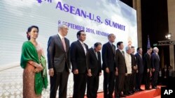 U.S. President Barack Obama, fifth left, poses for a family photos during the ASEAN-U.S. Summit Meeting at National Convention Center in Vientiane, Laos, Thursday, Sept. 8, 2016.