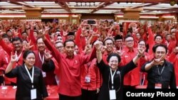 Ketua Umum PDI Perjuangan Megawati Soekarnoputri mengumumkan penetapan Jokowi sebagai calon presiden 2019-2024 di Rakernas PDI P di Bali, Jumat 23 Februari 2018. (Foto courtesy: Biro Pers Istana).