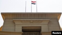 The Egyptian flag is seen atop the Supreme Constitutional Court building in Cairo in this July 4, 2013, file photo.