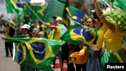 Supporters of Brazil's President Jair Bolsonaro protest against President-elect Luiz Inacio Lula da Silva who won a third term following the presidential election run-off, at Urban Military Sector in Brasilia, Brazil Nov. 1, 2022. 