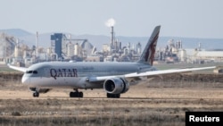 FILE PHOTO: A Qatar Airways plane lands at Teruel Airport