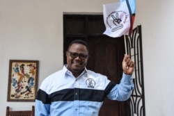 Tundu Lissu, the presidential candidate of Tanzania's main opposition Chadema party, speaks to the media at his home in Dar es Salaam, Sept. 9, 2020.