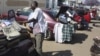 Hawkers sell goods on the streets of Zimbabwe's capital Harare, Sept.17, 2015.