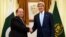 FILE - U.S. Secretary of State John Kerry (R) shakes hands with Pakistan's Prime Minister Nawaz Sharif in Islamabad August 1, 2013.