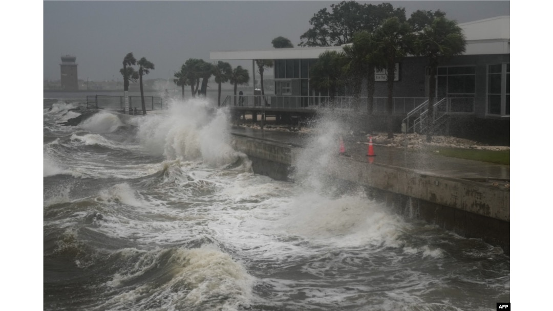 Waves crash along St. Pete Pier in St. Petersburg, Florida, as Hurricane Milton is expected to make landfall on Oct. 9, 2024.